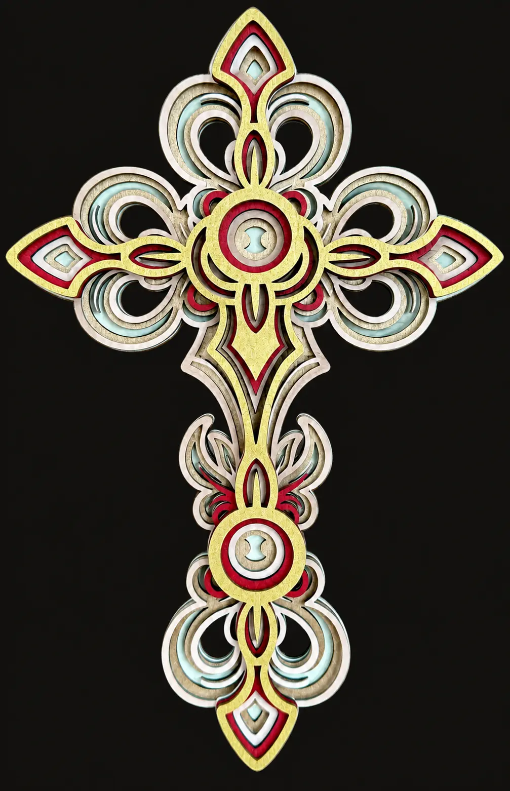 An ornate layered wood cross in gold, red, cream, and muted green.